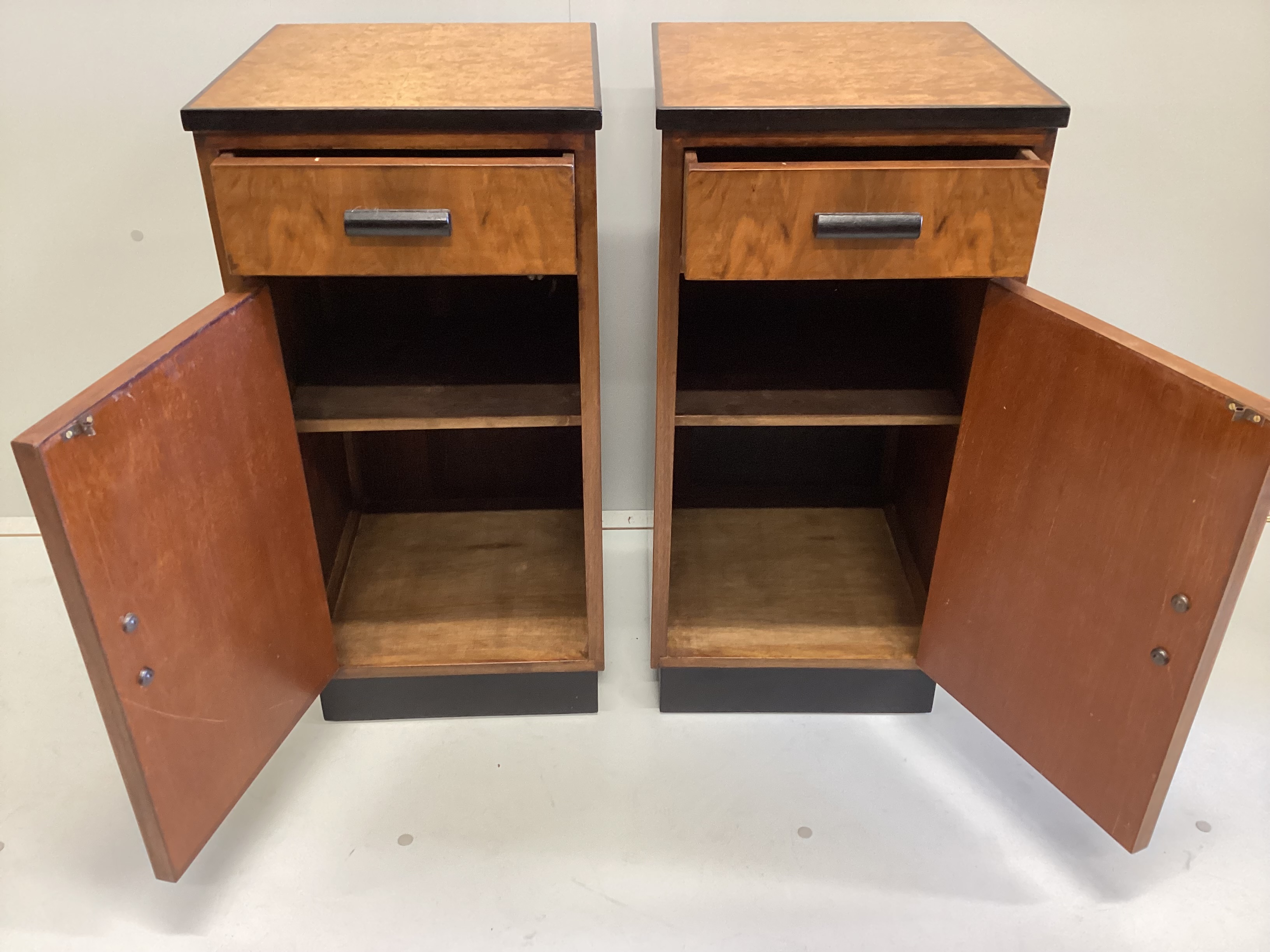 A pair of Art Deco style walnut and bird's eye maple bedside cabinets, width 36cm, depth 37cm, height 74cm